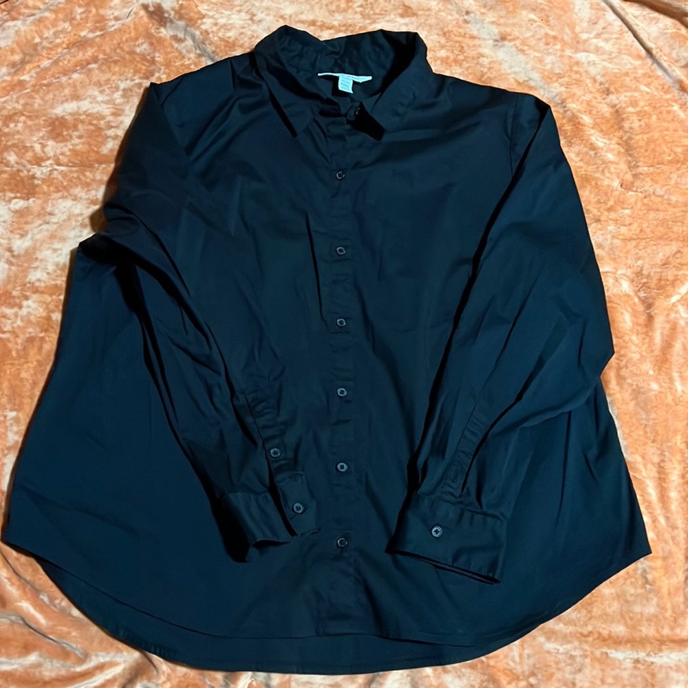 Women’s black button down blouse.